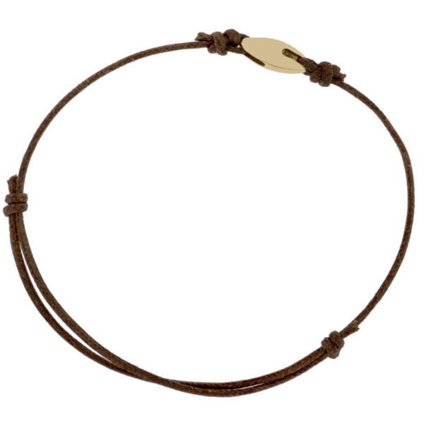 18 kt yellow gold men's bracelet with slip cord. Lucky bracelet, revisited in a modern key with essential lines.